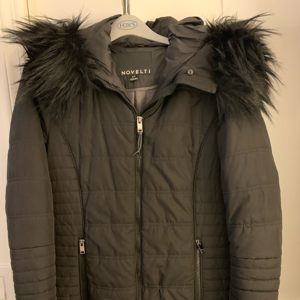 Novelti, warm wind and water resistant hooded parka.